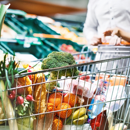 Spray bottle with cleaning liquids and colored sponges